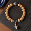 Hainan Semilla Dorada Cadena de Mano Grasa de Pollo Estrella Amarilla Luna Bodhi Madera de Durazno Flor de Loto Hombres y Mujeres Juego Cultural Pulsera de Cuentas Budistas Fabricante Mayorista
