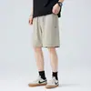 Pantalones cortos casuales de algodón de secado rápido y refrescantes para hombre, pantalones cortos deportivos de color liso, ligeros, antibacterianos y transpirables para el verano 2026, pantalones cortos hasta la rodilla al por mayor