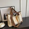 Bolso Tote de Lona de Gran Capacidad para Viajes Diarios Transfronterizos 2025 Nuevo Color Contrastante Correa Ancha para el Hombro Cruzado Bolso Popular para Mujer