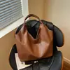 Bolso Tote Casual Retro de Gran Capacidad Transfronterizo para Mujer Otoño 2026 Nuevo Sensación de Alta Gama Textura Tejida Bolso de Mano para Hombro