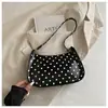 Bolso brillante de charol de lunares de nicho para mujer, nuevo bolso cruzado de moda 2026, bolso para el hombro y debajo del brazo súper popular