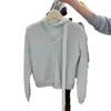 Top de Punto para Mujer Coreano de Manga Larga Azul con Cuello en V, Sentido del Diseño, Encaje Fluyente, Estilo Occidental para Mujeres Pequeñas, Otoño e Invierno 2024