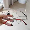 Montura de Gafas Metálica Estilo Cat-Eye Espejo Plano Ceja Miopía Diseño Hueco Simple Moda Negocios Hombres y Mujeres Gafas Anti-Luz Azul