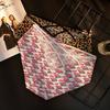 2026 Nuevo Estilo Seda de Hielo Sin Costuras Sexy Estampado de Leopardo Calzones Populares de Cintura Media Moda Estampado Triángulo Hueco en la Espalda Calzones para Mujeres