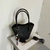Bolso bandolera tejido de patrón minimalista retro para mujer, nuevo bolso cruzado versátil para el día a día 2026, bolso casual de un solo hombro para madre e hija