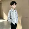 Ropa infantil chaqueta para niños primavera y otoño 2026 nuevo atuendo de otoño fresco y elegante camisa de otoño para niños moderna