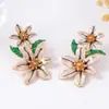 Estilo nacional nueva moda personalidad creativa hermosos pendientes de aleación con gota de aceite de flor pendientes de aceite de flor todo partido pendientes al por mayor