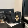 Bolsa de palha trançada estilo simples para mulheres, nova coleção 2026, bolsa de ombro de grande capacidade, bolsa de mão elegante e versátil