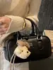 Bolsa de Bowling de Mano Estilo Simple y Dulce Nueva Colección Primavera 2026 Bolso Cruzado Casual de Moda Elegante de Alto Valor para Mujer