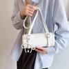 Bolsa Cilíndrica Portátil Estilo Coreano PU Simple y de Moda 2026 Nueva Bolsa de Hombro para Mujer Diseño de Nicho Versátil Bolsa de Hombro para Mujer