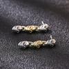 Venta al por mayor de fábrica joyería de moda de plata de ley S925 personalidad conexión de calavera pendientes creativos pendientes para hombres y mujeres