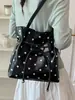 Bolso de mujer de moda, nuevo modelo 2026, bolso de mano versátil para el día a día, estilo casual simple de lunares, bolso cruzado tipo cubo de moda