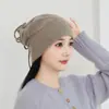 Macio e Pegajoso Caxemira 2026 Outono/Inverno Novo Estilo Feminino Jacquard Cordão Proteção Auricular Quente Moda Proteção Contra Frio Gorro Turbante de Tricô