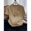 2026 Verano Diseño de Línea de Espina de Pescado de Nicho Minimalista Holgado Adelgazante Versátil Gris Camiseta de Manga Corta Top para Mujer