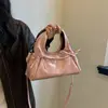 Exquisito y moderno bolso pequeño para mujer, nuevo bolso cruzado versátil y elegante de verano 2026, bolso tote pequeño de moda muy vendido