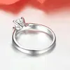 Anillo de diamante de cuatro garras de plata de ley S925 Popular europeo y americano simple moda clásico micro diamante Anillo pulsera para mujer