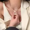 Cadena de Suéter Sudadera de Acero de Titanio Dorado para Mujer Lujo Accesible Nicho Elegante de Gama Alta Collar con Colgante Largo Accesorios de Otoño e Invierno