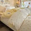 Juego de ropa de cama de gasa de doble capa de cuatro piezas 2026 nuevo diseño estampado estilo ins para dormitorio de estudiante camas individuales y dobles juego de tres piezas
