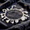 Pulsera con trece colgantes de moda exagerada de plata 925, joyería europea y americana transfronteriza para mujer, joyería de moda multielemento al por mayor