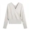 Atacado de roupas femininas estilo europeu e americano Ins, nicho, conjunto de tricô com gola cruzada e calça de tricô de cintura alta com amarração na cintura