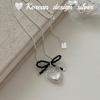 Collar de cadena de clavícula de alta gama con diseño de estilo coreano, plata de ley S925, corazón transparente y lazo acrílico.