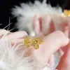 Tienda de Oro Mismo Estilo Arena Dorada Hielo Triturado Filigrana Mariposa Anillo Ajustable Diseño de Nicho Lujo Ligero Color Duradero Anillo