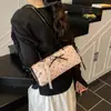 Bolso Satchel de Verano Rosa Súper Caliente con Lazo Bolso Almohada Bolso de Mujer 2025 Nuevo Bolso Cruzado de Alta Gama Estilo Ballet