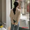 Camisa de gasa floral de moda con mangas largas, estilo vintage de Hong Kong para principios de otoño, blusa dulce holgada con mangas abullonadas, top elegante para mujer