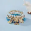 Pulsera Popular Bohemia Multicapa de Cristal Transfronteriza con Colgante de Hoja y Cordón Elástico, Venta al por Mayor desde Fabricante en Stock