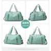 2023 nueva bolsa de viaje de gran capacidad para hombre y mujer, bolso de mano con separación húmeda y seca, bolsa deportiva Oxford para Fitness, venta al por mayor