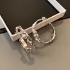Pendientes de Metal Asimétricos con Textura de Lava Ins Europeos y Americanos Pendientes Exagerados de Diseño de Nicho para Mujer Pendientes de Gama Alta
