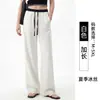 Pantalones de traje personalizados para hombre alto talla extra, de seda de hielo, contraste blanco y negro, corte estrecho, diseño transfronterizo y patronaje de fábrica de ropa de muestra