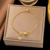 [Collar + Pulsera] Estilo Francés Ins de Lujo Accesible Cadena para Clavícula de Corazón Estilo Dulce Collar de Acero de Titanio con Borla de Corazón de Melocotón para Mujer