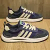 Venta al por mayor de fábrica Zapatos de moda Love Cycle 2025 Otoño e Invierno Zapatos para hombre Zapatos deportivos de cuero Impermeables Modernos Casuales Retro