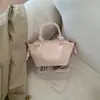 Bolsos de Diseño de Nicho para Mujer 2026 Nuevo Primavera/Verano Versátil Casual Bolso Cruzado Bolso de Mano Súper Popular Bolso Cubo