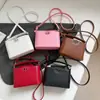 Bolso Pequeño Cuadrado Portátil Transfronterizo para Mujer 2025 Nuevo Estilo Bolso de Hombro Moda Retro de Gama Alta Bolso Cruzado de Cubo Nicho