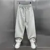 Pantalones Casuales Nuevos de Estilo Scimitar para Hombre Primavera y Otoño 2025 Estilo Coreano de Moda Sueltos Pierna Recta Parches Marca de Moda Pantalones Deportivos para Hombre