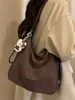 Bolsas de nicho Shuai Mi Jia, bolsa feminina de grande capacidade, mochila modelo 2026 novo, bolsa de ombro tote casual fashion