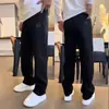 Pantalones deportivos de punto para hombre a la moda, nuevo estilo otoño e invierno 2025, corte holgado, pantalones casuales negros para correr