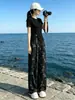 Conjunto Duas Peças: Blusa Preta de Manga Curta com Gola Redonda e Calça Wide Leg - Traje Esportivo Casual Emagrecedor para Mulheres - Verão 2026