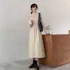 Otoño 2023 Nuevo elegante vestido suéter negro Francés manga larga base tejido vestido de punto mujer otoño e invierno