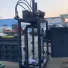 Prensa Hidráulica para Exportación de Ropa, Adecuada para Ropa, Juguetes, Redes de Pesca, Película, Etc.. Máquina Embaladora y Atadora de Haz de Cuatro Puertas
