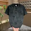Dropshipping Internacional Marca da Moda Estampa de Folha Gola Redonda Manga Curta Verão Nova Moda Versátil Casual Jovem Camiseta