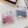 Lindo set de goma para el cabello de colores gruesas y desechables para bebés, empaquetado en bolsa de dibujos animados, que no dañan el cabello, directo del fabricante