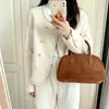 Outono/Inverno 2026 Novo Casaco de Lã de Alto Padrão Estilo Pequeno Chanel Feminino Curto de Botão Duplo Casual para o Trabalho