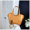 Bolso de mano de alta gama, elegante, de nicho para mujer, nuevo y moderno, bolso tipo cubo vintage para el día a día, bolso versátil de hombro y cruzado