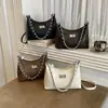 Bolso de mano pequeño de alta gama para mujer, nuevo bolso de moda 2026 con cadena para el hombro, bolso de hombro texturizado estilo coreano, bolso cruzado versátil
