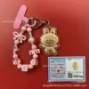 Llavero de tela con logo de empresa personalizado Cadena para teléfono móvil Angela Lámina de oro puro Oro 999 Regalo de aniversario