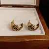 Pendientes de Moda Versátiles de Lujo Ligero de Personalidad de Nicho Temperamento Pendientes Europeos y Americanos de Oro Gota de Aceite Estampado de Leopardo