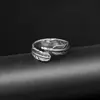 Anillo de acero titanio pluma nuevo de Amazon acero inoxidable joyería popular europea y americana al por mayor serie punk